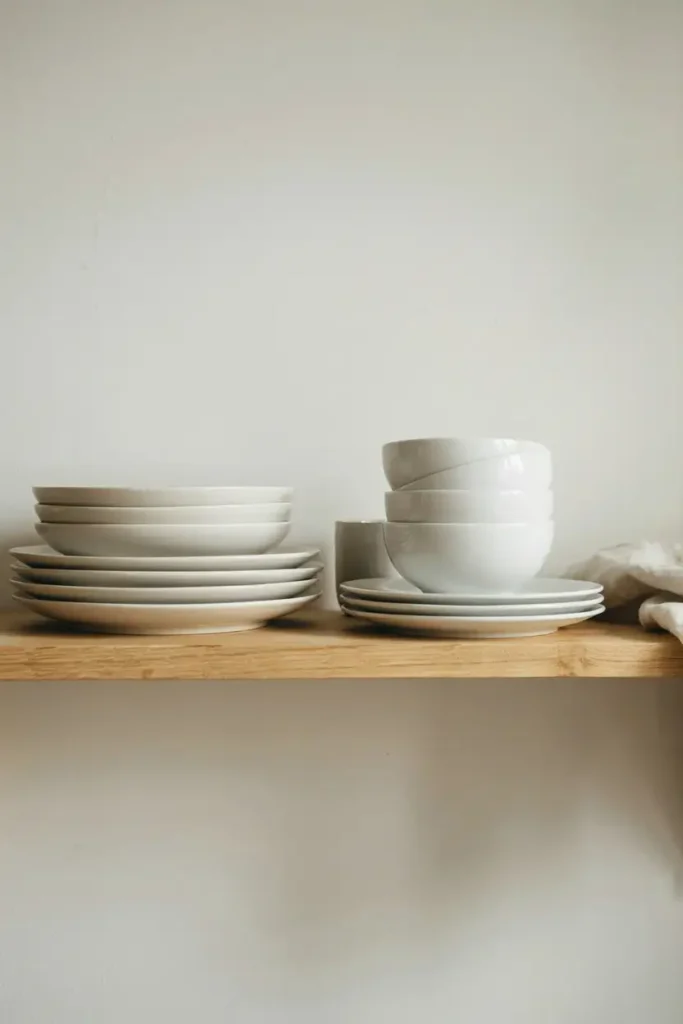 12 Stylish Open-Shelf Kitchen Decorating Ideas 4 Minimalist White Dish Stack