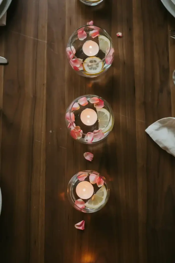 16 Upcycled Candle Jar Ideas 7 Floating Candle Centerpiece