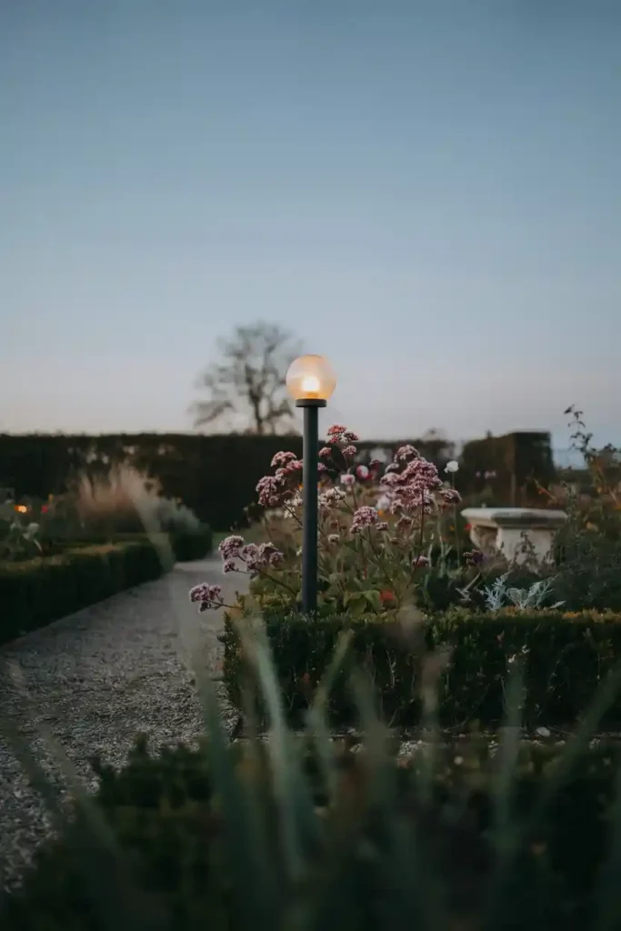 16 Minimalist Garden Lighting Ideas 13 Frosted Globe Post Lights